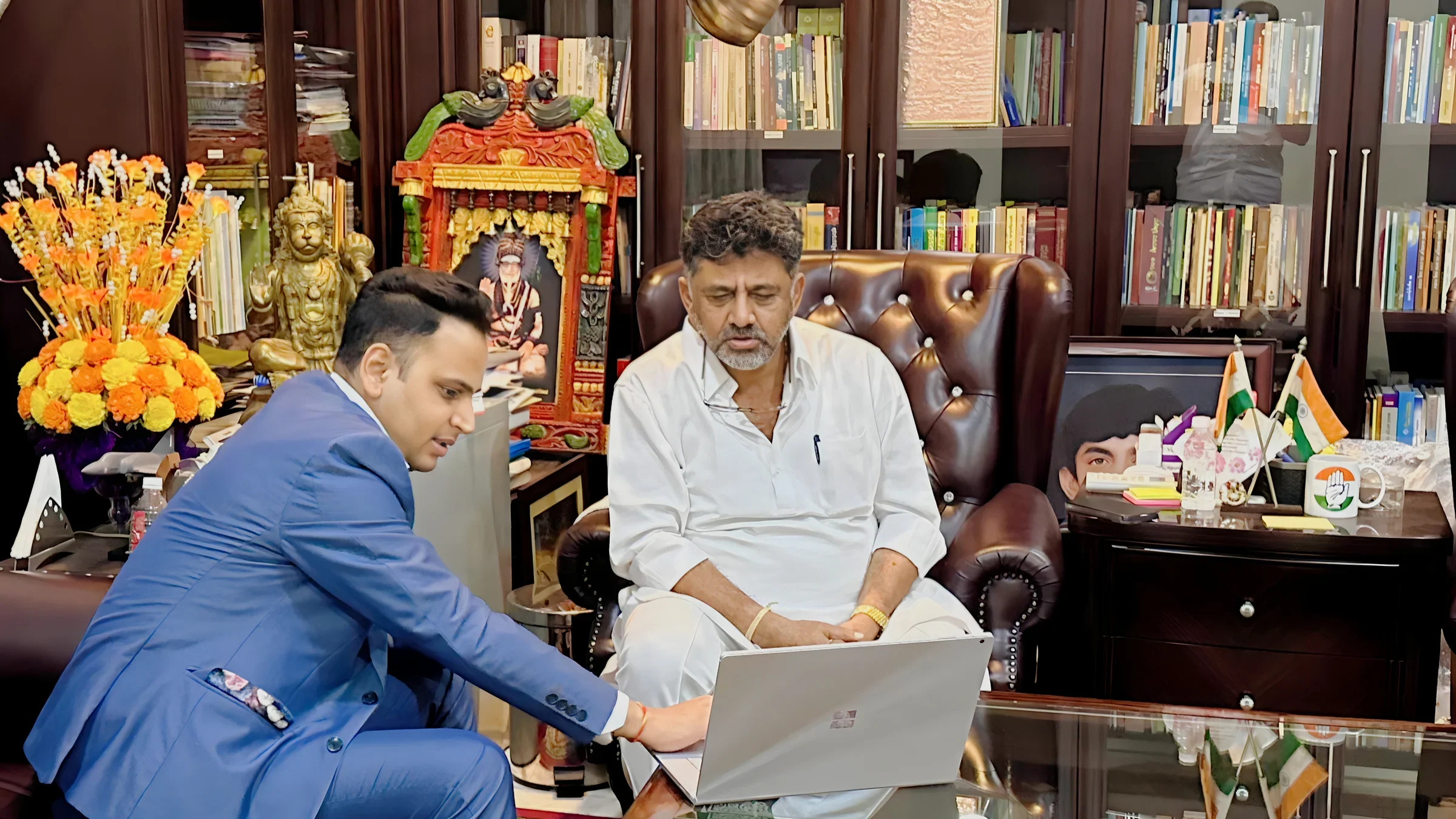 Lithvik Mukesh Sharma is photographed with D. K. Shivakumar at his office in Bengaluru.