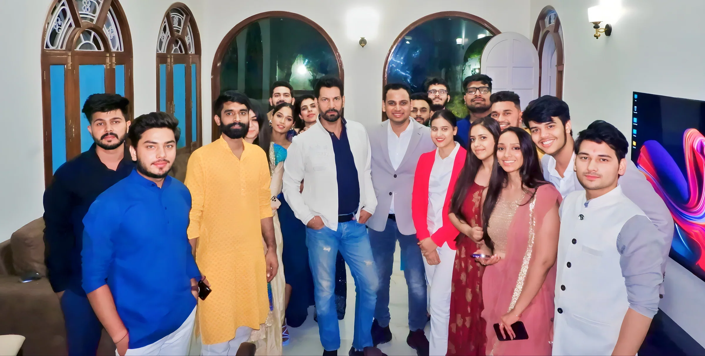 Lithvik Mukesh Sharma is photographed with Dr. Jyoti Kush and Jasbir Jassi at a Diwali party.