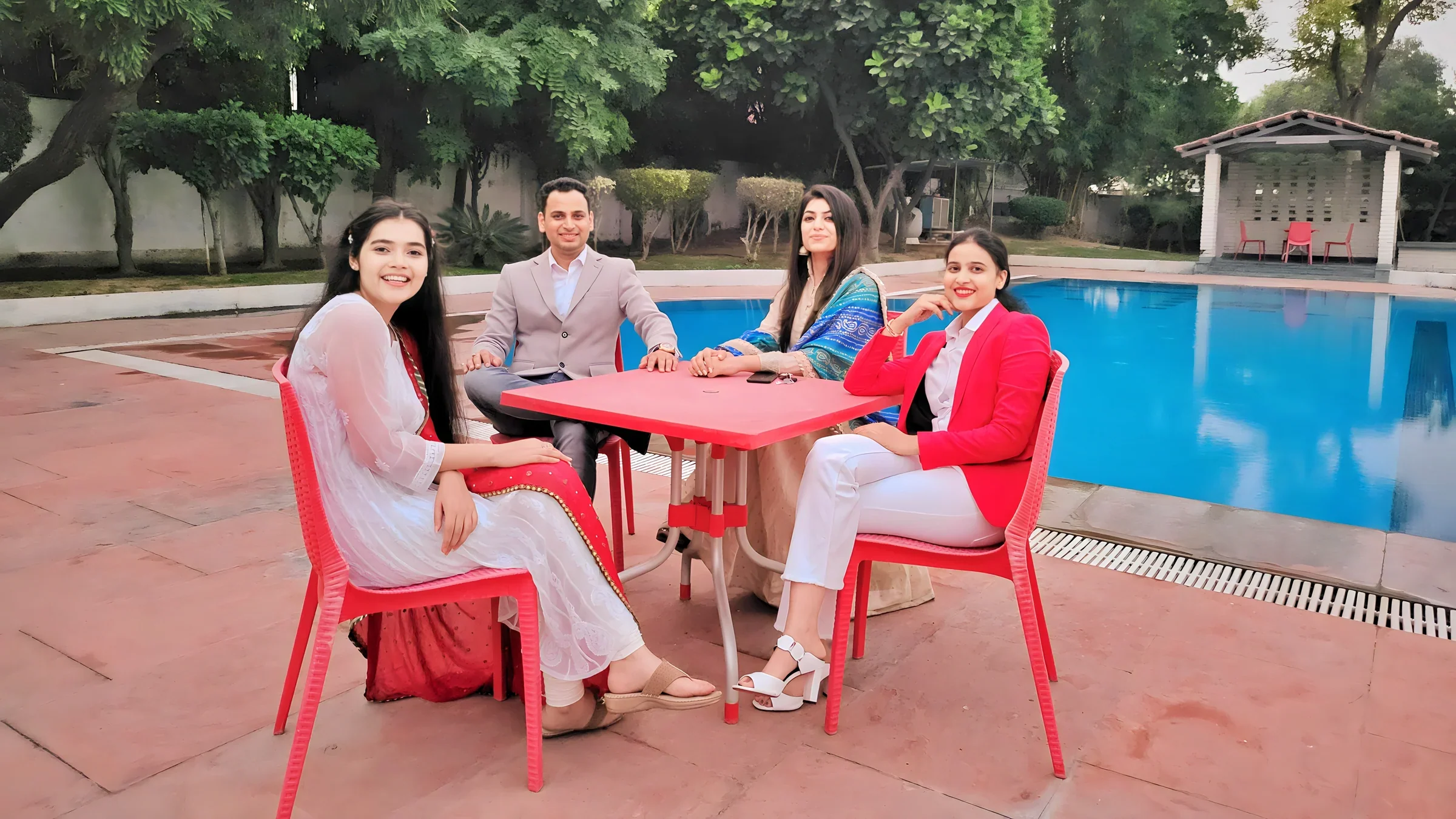 Lithvik Mukesh Sharma is photographed with international partners.