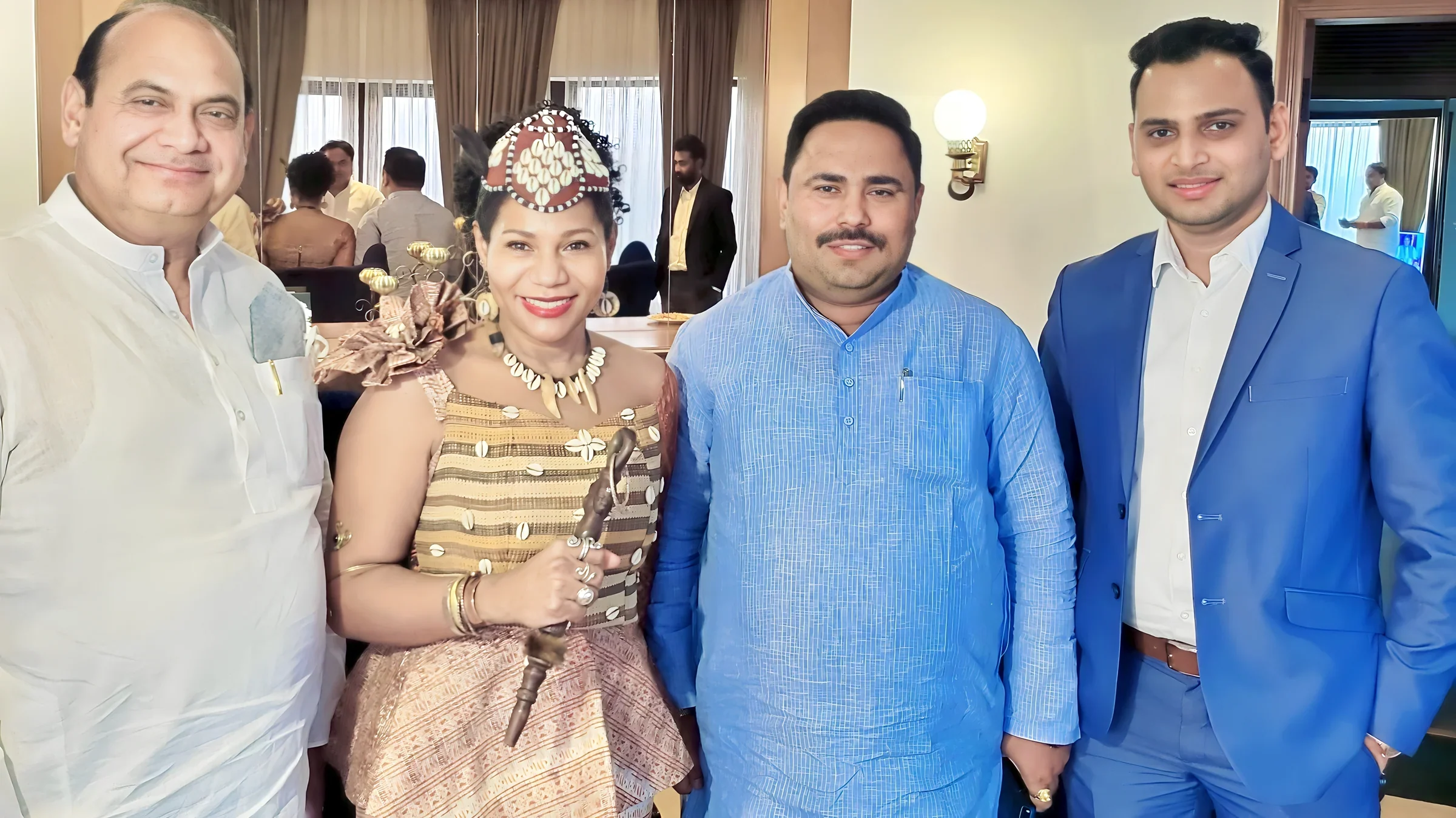 Lithvik Mukesh Sharma is photographed with Queen Diambi and senior party leaders at a get-together with friends and associates