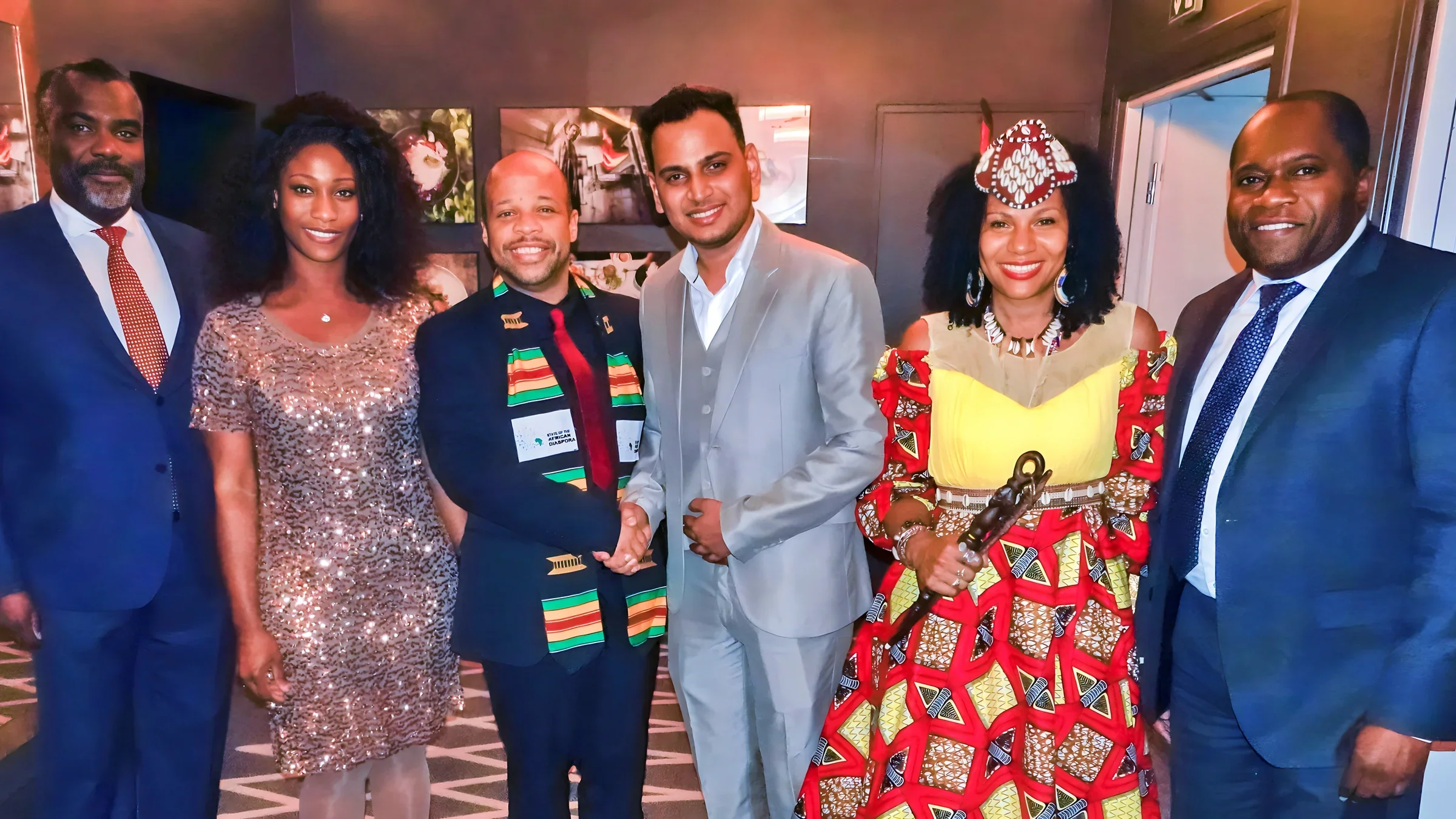 Lithvik Mukesh Sharma is photographed with Cinthia Loïs Ta Thomsen, Dr. Louis-Georges Tin, and Queen Diambi at the African Diaspora summit.
