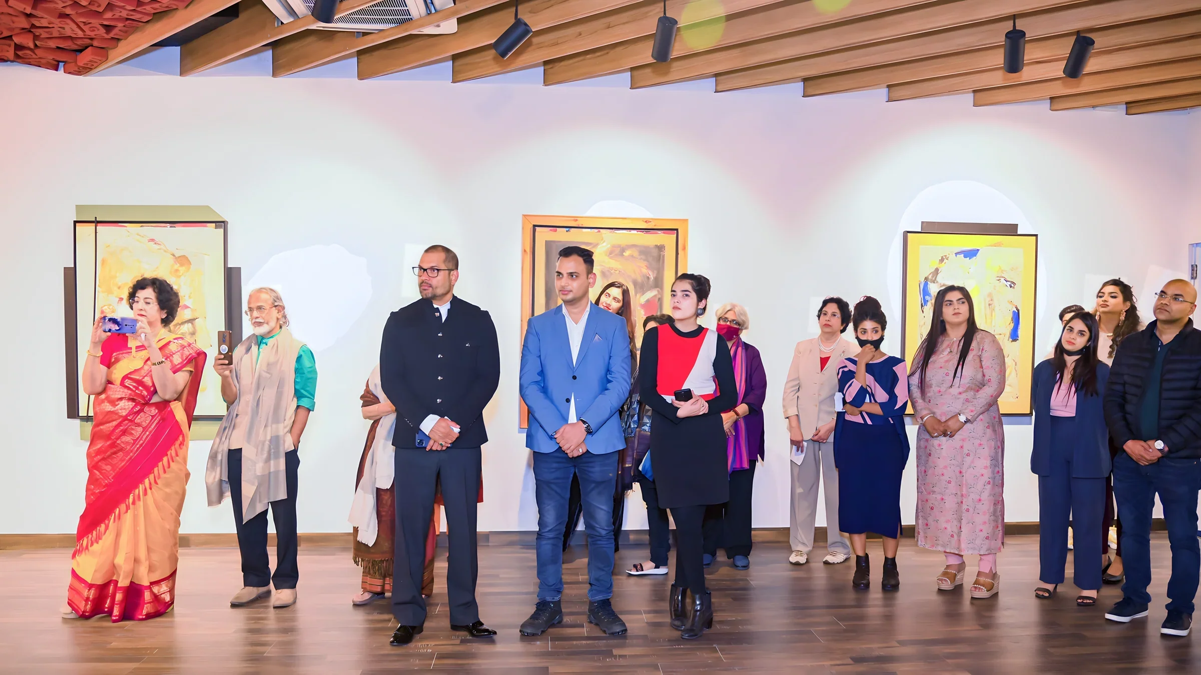 Lithvik Mukesh Sharma is photographed with Subrat Nath, Kapil Madan, and Sumer Raj Chadha at an art event